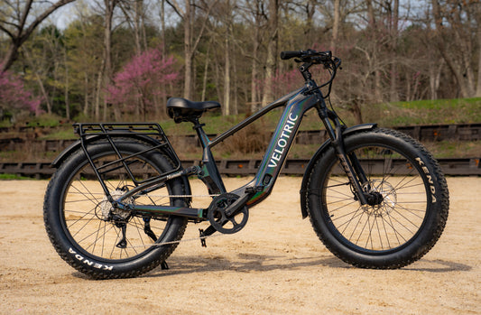 Velotric Nomad 2X e-bike on a scenic Tampa Bay trail with water view
