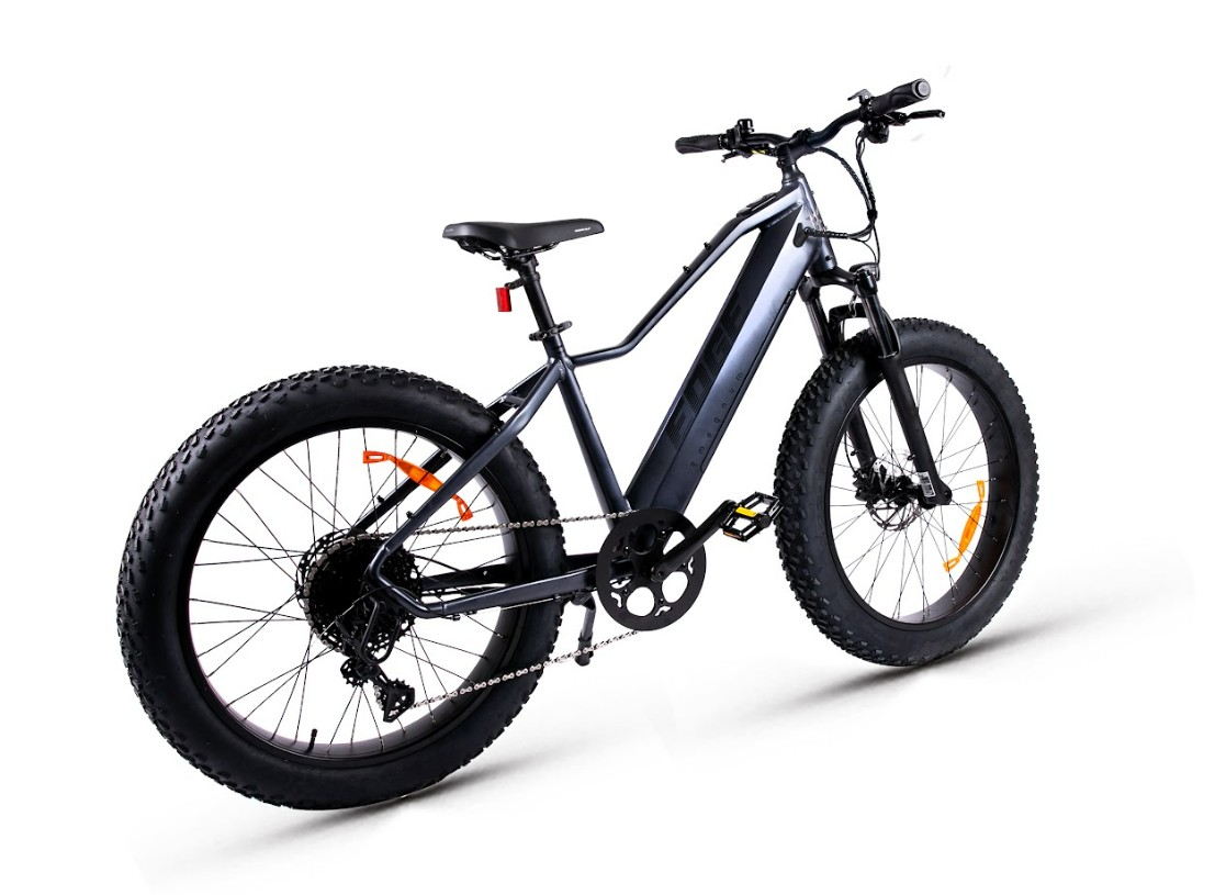 The Magnum - Edge by Tampa Bay eBikes is a black electric fat-tire bike with a 750W motor, front suspension fork, disc brakes, and orange wheel reflectors, displayed on a white background.