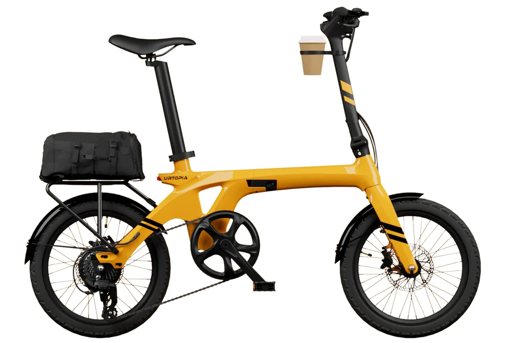 The Urtopia Carbon Fold 1 by Urtopia is a yellow folding eBike with a carbon fiber frame, black wheels, rear-mounted bag, and a handlebar cup holder, displayed on a white background.