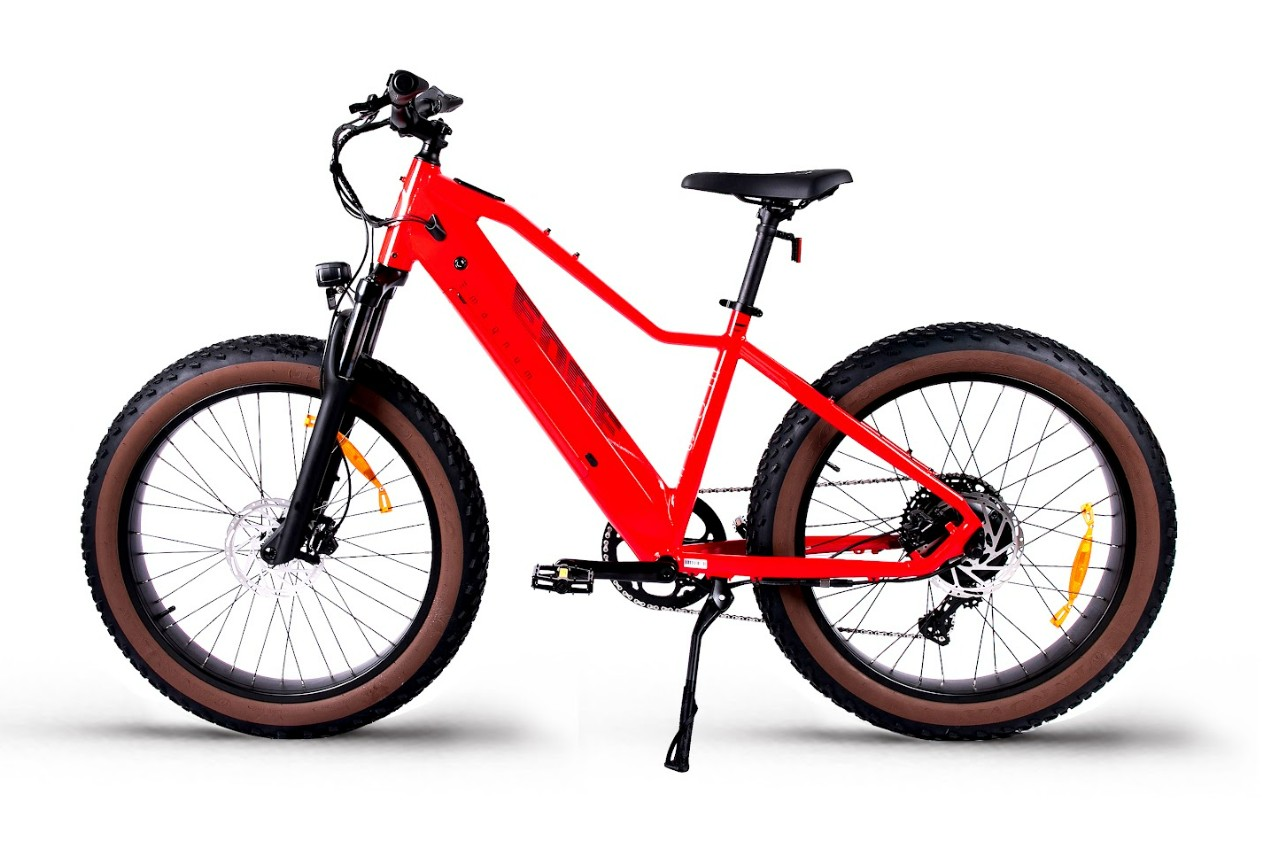The Magnum - Edge by Tampa Bay eBikes is a red fat-tire eBike with a 750W motor, black front suspension fork, brown-treaded tires, and rear derailleur, displayed on a white background.