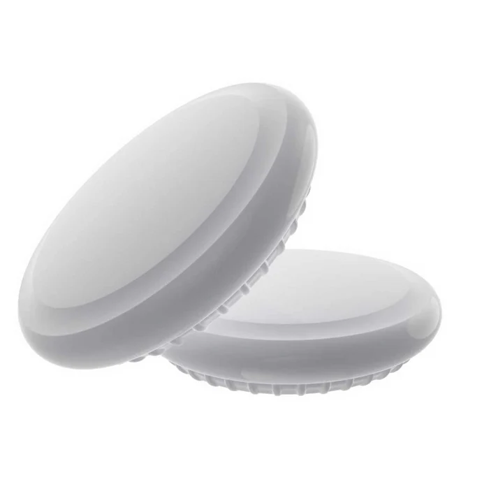 Two round, white, plastic LED puck lights stacked together on a plain white background—ideal for boosting bike security or pairing with your Urtopia - AirTag Kit for smarter eBike tracking.
