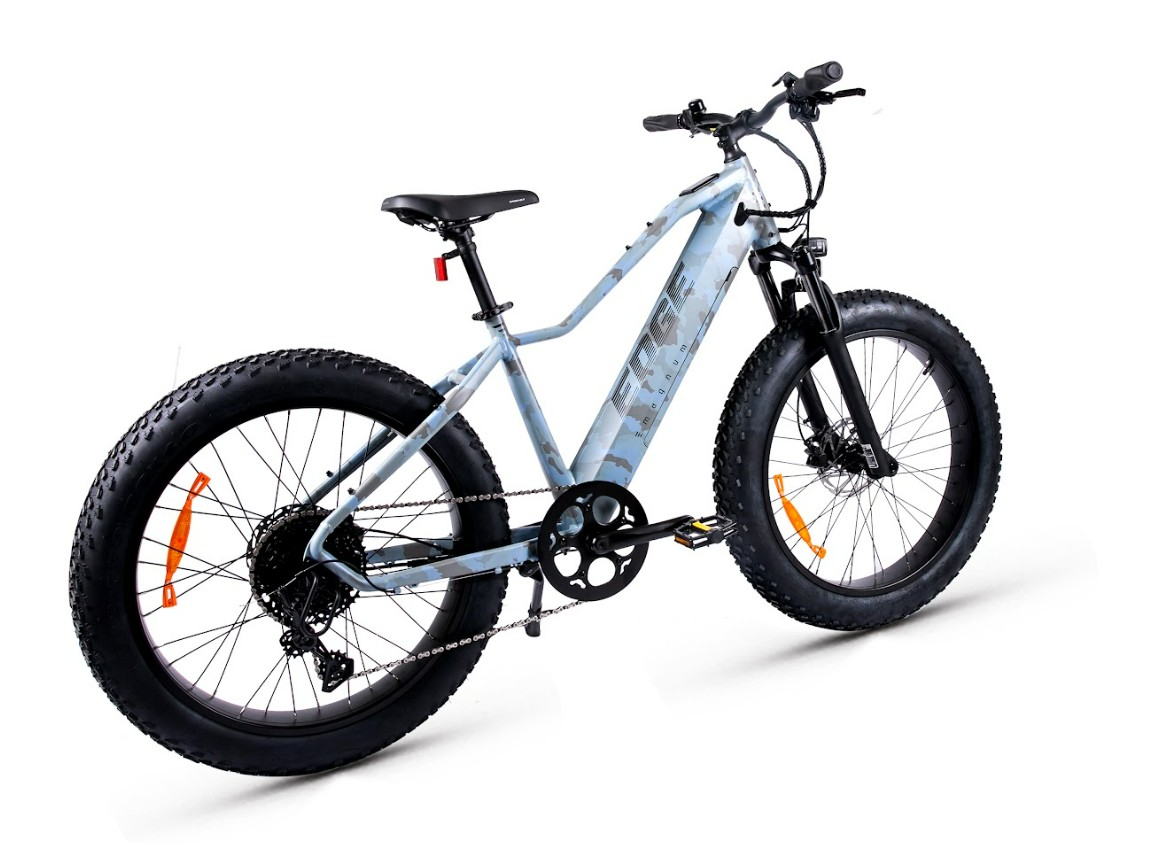 The Magnum - Edge by Tampa Bay eBikes is a fat-tire eBike featuring a 750W motor, white frame, disc brakes, front suspension, and wide black tires, displayed on a white background.
