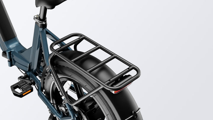 Close-up of the rear wheel and cargo rack of a HeyBike Ranger S folding electric bicycle, highlighting its compact design and sleek blue frame.
