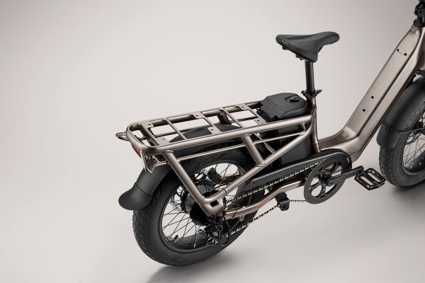 Electric cargo bike with a rear carrier, showcased against a neutral background by Momentum - Cito E+ by Tampa Bay eBikes.