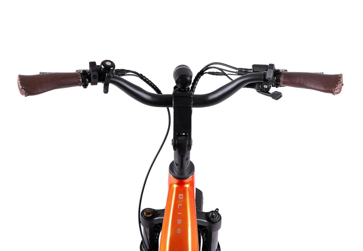 Straight-on view of the Magnum - Bliss handlebar with brown grips and brake levers, on an orange Tampa Bay eBikes frame featuring a 500W motor, shown against a white background.