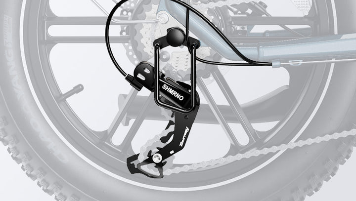 Close-up of a HeyBike rear derailleur mounted on a HeyBike Ranger S folding electric bike, showing detail of the gear mechanism and wheel.