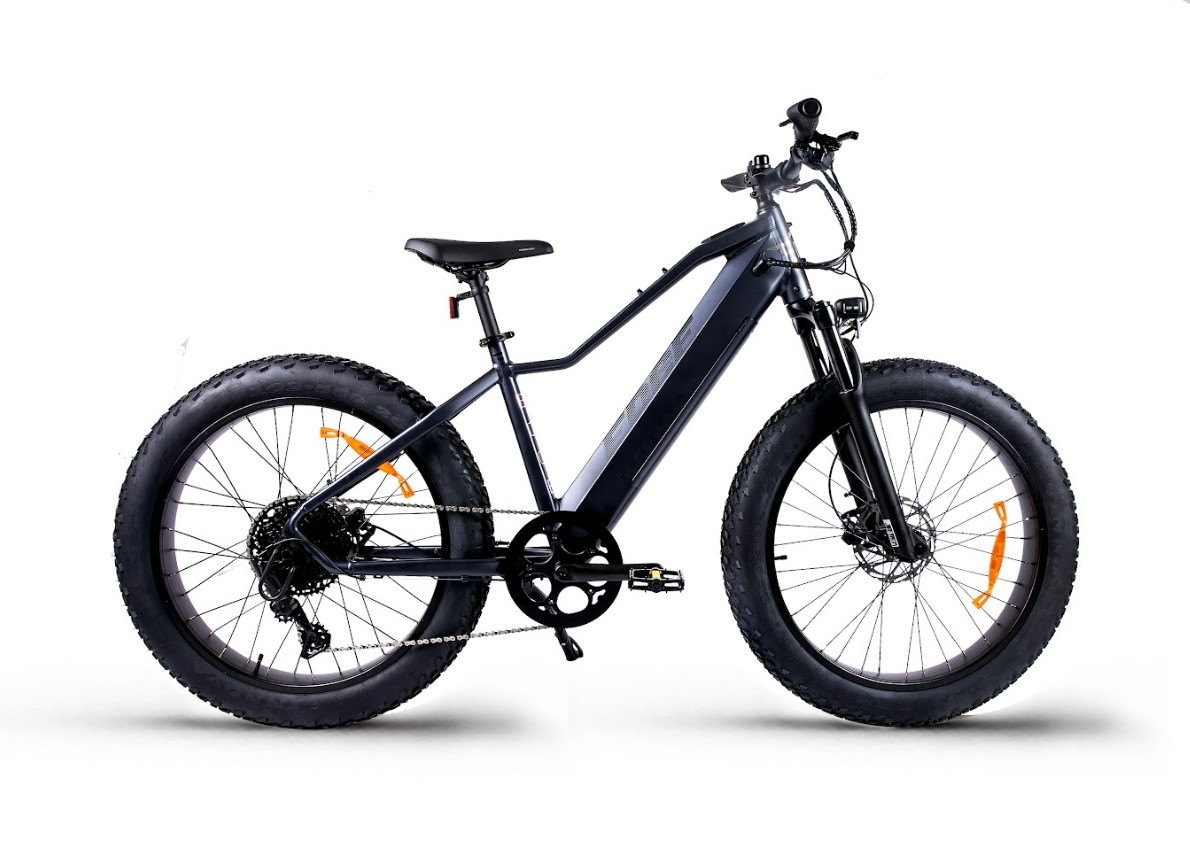 The Magnum - Edge by Tampa Bay eBikes is a black electric mountain bike with thick knobby fat tires, a 750W motor, and front suspension, shown in a side view against a white background.
