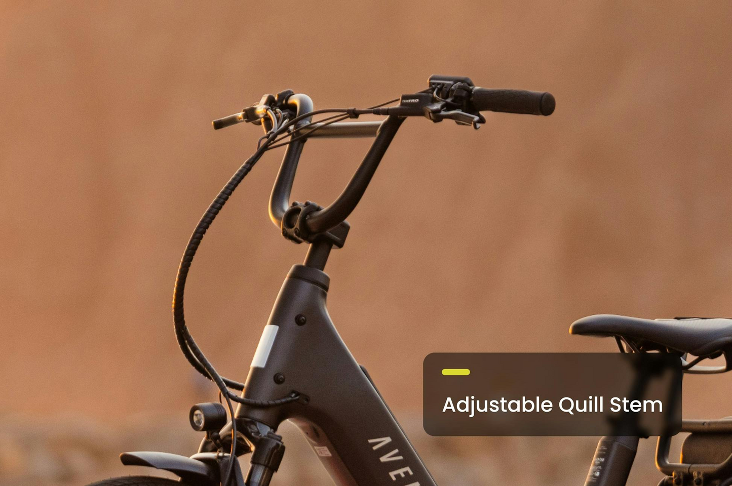 Close-up of the Aventon - Abound LR cargo e-bike’s handlebar area featuring an adjustable quill stem, with "Adjustable Quill Stem" text label in the foreground.