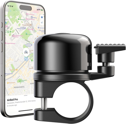 The Airbell Pro by Tampa Bay eBikes is a hidden bike bell, shown in front of a smartphone displaying a map with a bicycle icon, suggesting integrated bike tracking and navigation.
