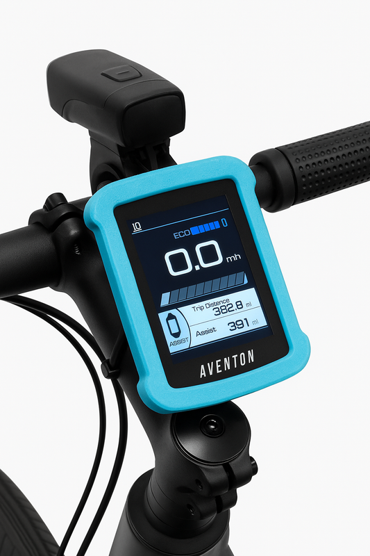 Close-up of an Aventon e-bike handlebar with a BC280 digital display, protected by Tampa Bay eBikes' Aventon - Display Cover in blue 3D print, showing speed, trip distance, and assist level.