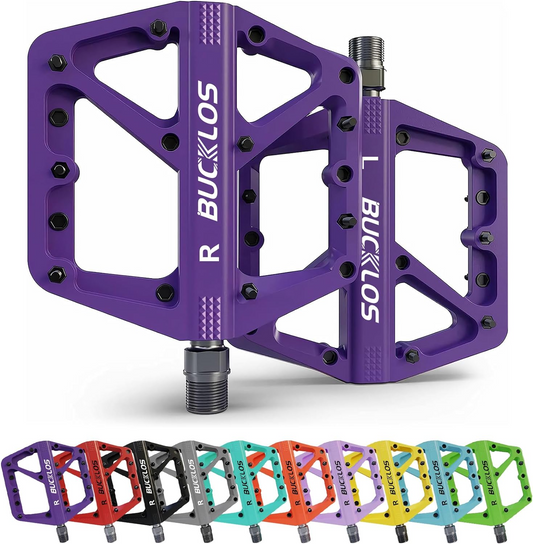 Purple Bucklos cycling pedals displayed with options in various colors including red, orange, yellow, green, blue, and more by Tampa Bay eBikes.