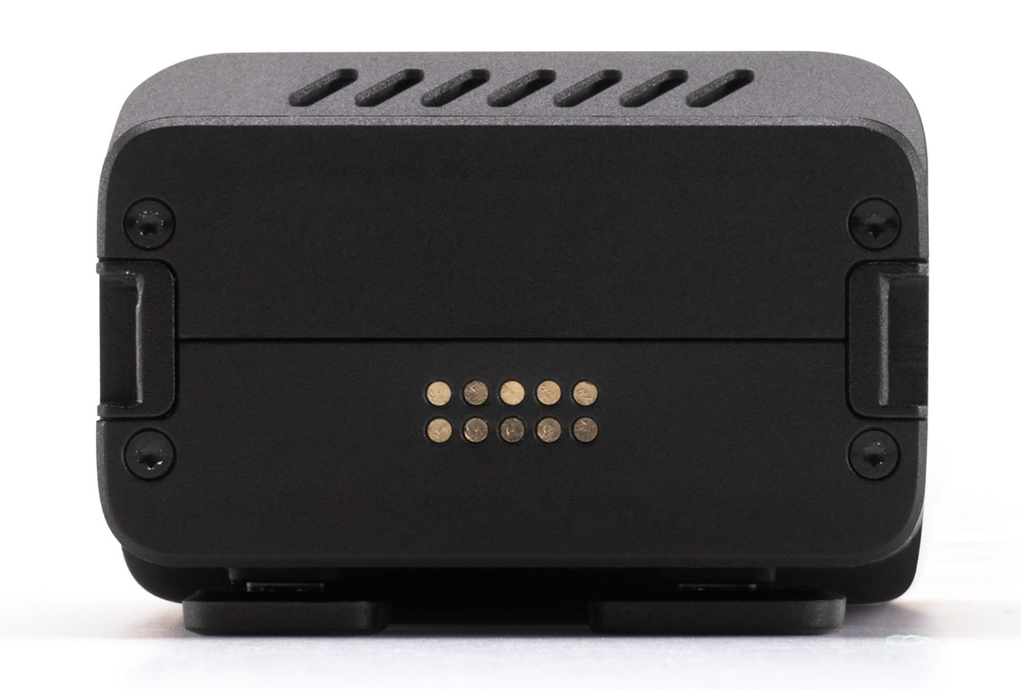 The HOVERAir Beacon by HOVERAir is a sleek black device with a rectangular design, featuring multiple round metallic contacts and four screws on its front panel. Its intelligent battery ensures extended flight time for uninterrupted performance.