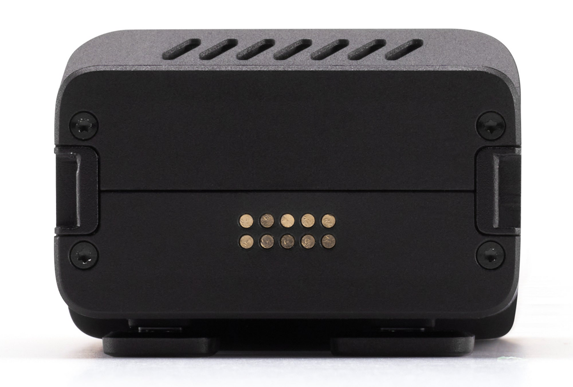 The HOVERAir Beacon by HOVERAir is a sleek black device with a rectangular design, featuring multiple round metallic contacts and four screws on its front panel. Its intelligent battery ensures extended flight time for uninterrupted performance.