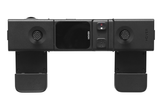 The HOVERAir Beacon and JoyStick Bundle by HOVERAir is a sleek black device with buttons, sensors, and HoverLink technology. It includes foldable parts and a central display for real-time monitoring at your fingertips.