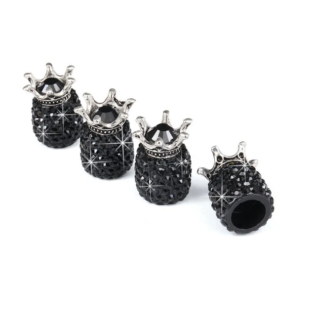 EPWR Valve Gems - Onyx Crowns: four black, rhinestone-studded crown-shaped charms in a row on white—ideal as sparkling bike valve stem caps.