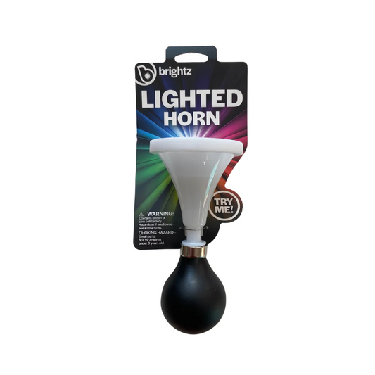 The Brightz Squish Horn by Brightz features a white plastic bell, black rubber bulb, and "TRY ME!" button—displayed on a colorful card. Pair it with your LED helmet light for extra fun and safety!.
