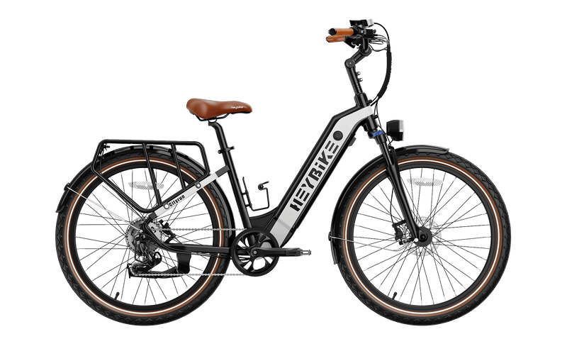 Black and white HeyBike- Cityrun ebike with a rear cargo rack and hydraulic front suspension, positioned against a transparent background.