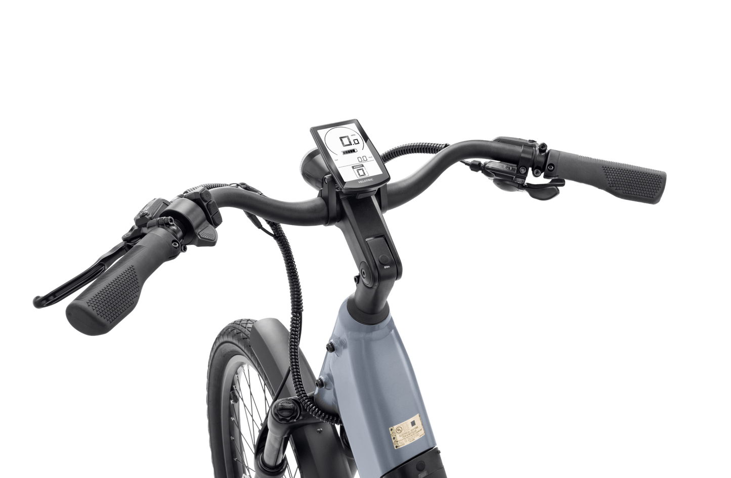 Close-up view of the handlebars and display screen of a blue Velotric - Discover 1 Plus commuter e-bike, showcasing the powerful Velopower H50 drive system against a black background.