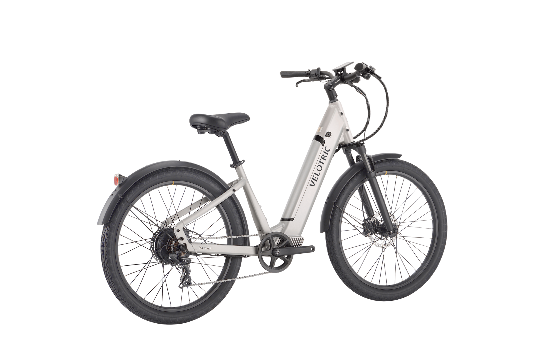 A white commuter e-bike with thick tires, a black saddle, and a front suspension fork. The words "Velotric - Discover 1 Plus" are printed on the down tube. Featuring a powerful Velopower H50 drive system, the bike also has a rear rack and disc brakes.