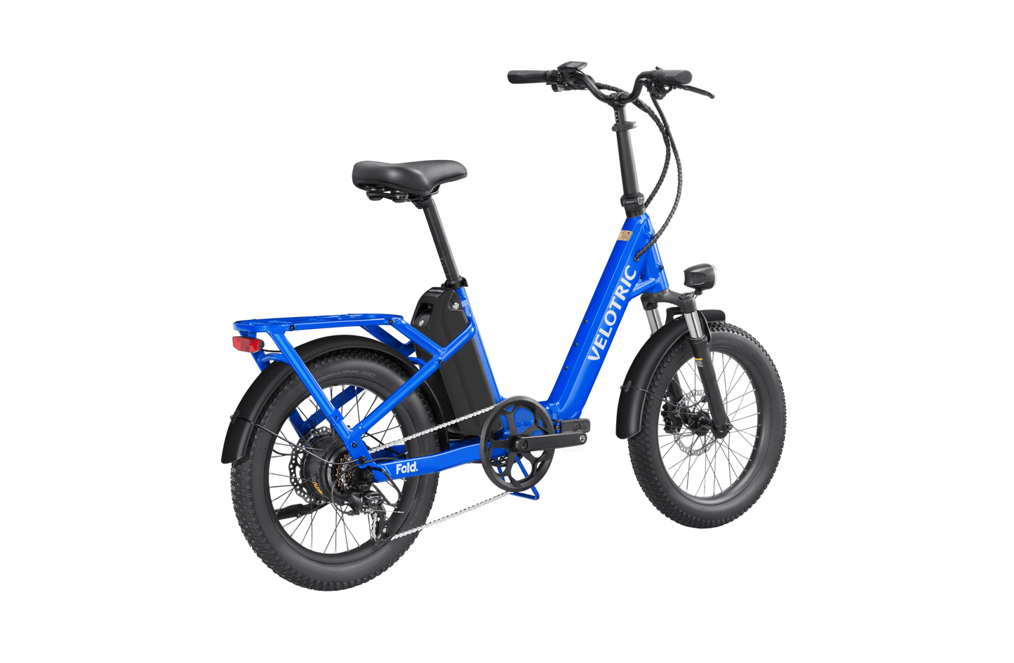Velotric - Fold 1 electric folding bicycle with thick tires and a rear carrier, displayed against a black background.