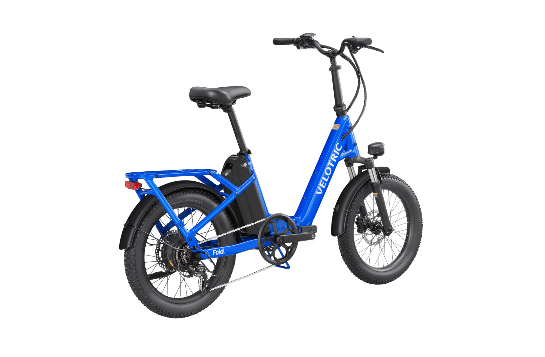 Velotric - Fold 1 electric folding bicycle with thick tires and a rear carrier, displayed against a black background.