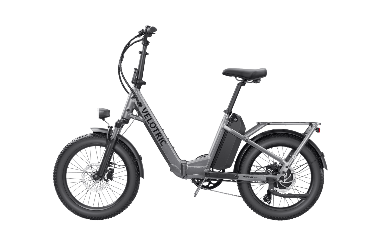 An Velotric electric folding eBike with thick tires and a prominent battery mounted on the frame, displayed on a black background.