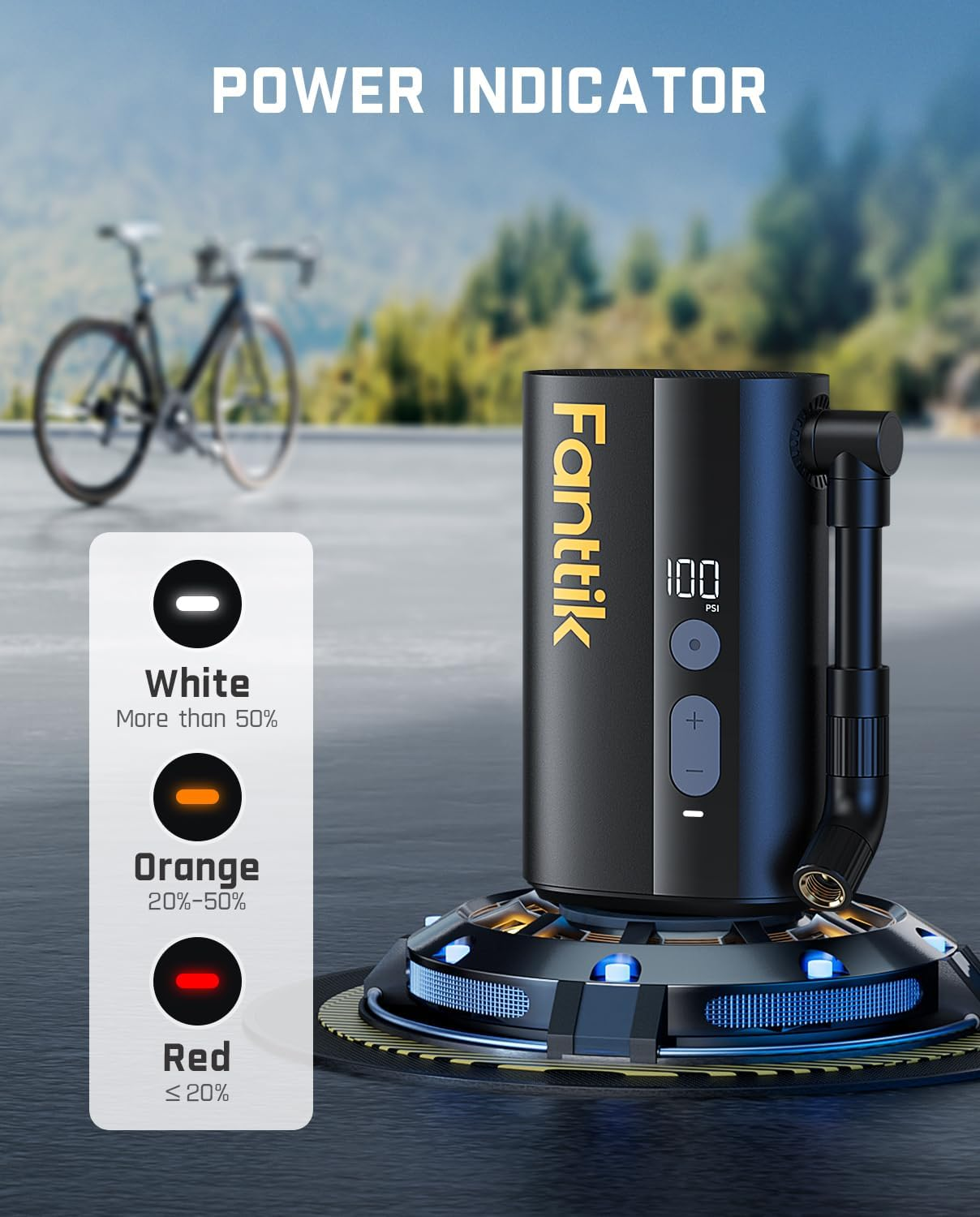 The Fanttik X9 Ace Mini portable air pump rests on a platform, displaying LED power indicators: white (over 50%), orange (20–50%), and red (20% or less). A bicycle appears in the background.