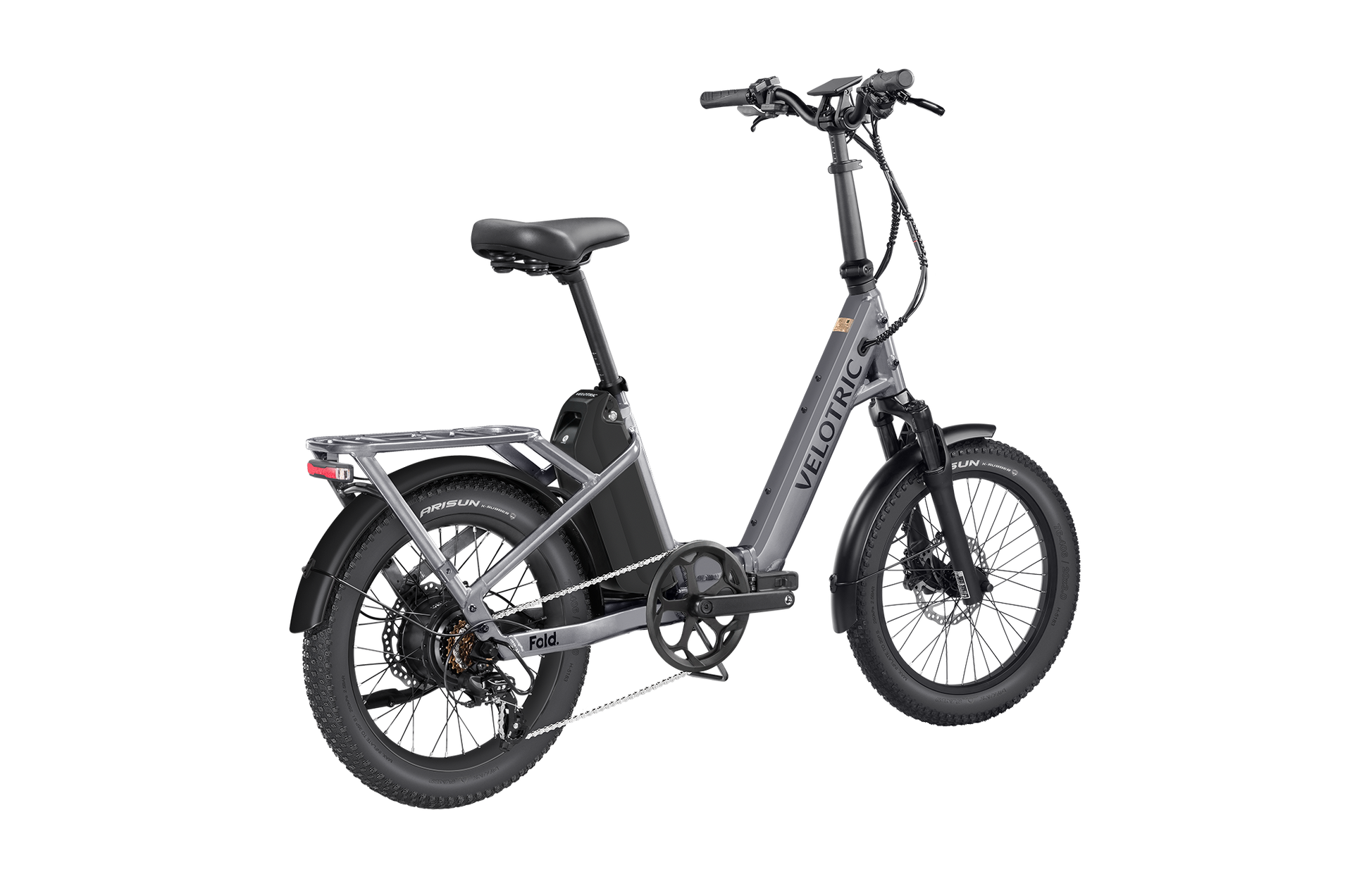 The Velotric Fold 1 Plus is a sleek silver eBike with thick tires, front and rear lights, a handy rear rack, and a foldable design for easy storage. It features a black seat and handlebars with "Velotric" branding on the frame.
