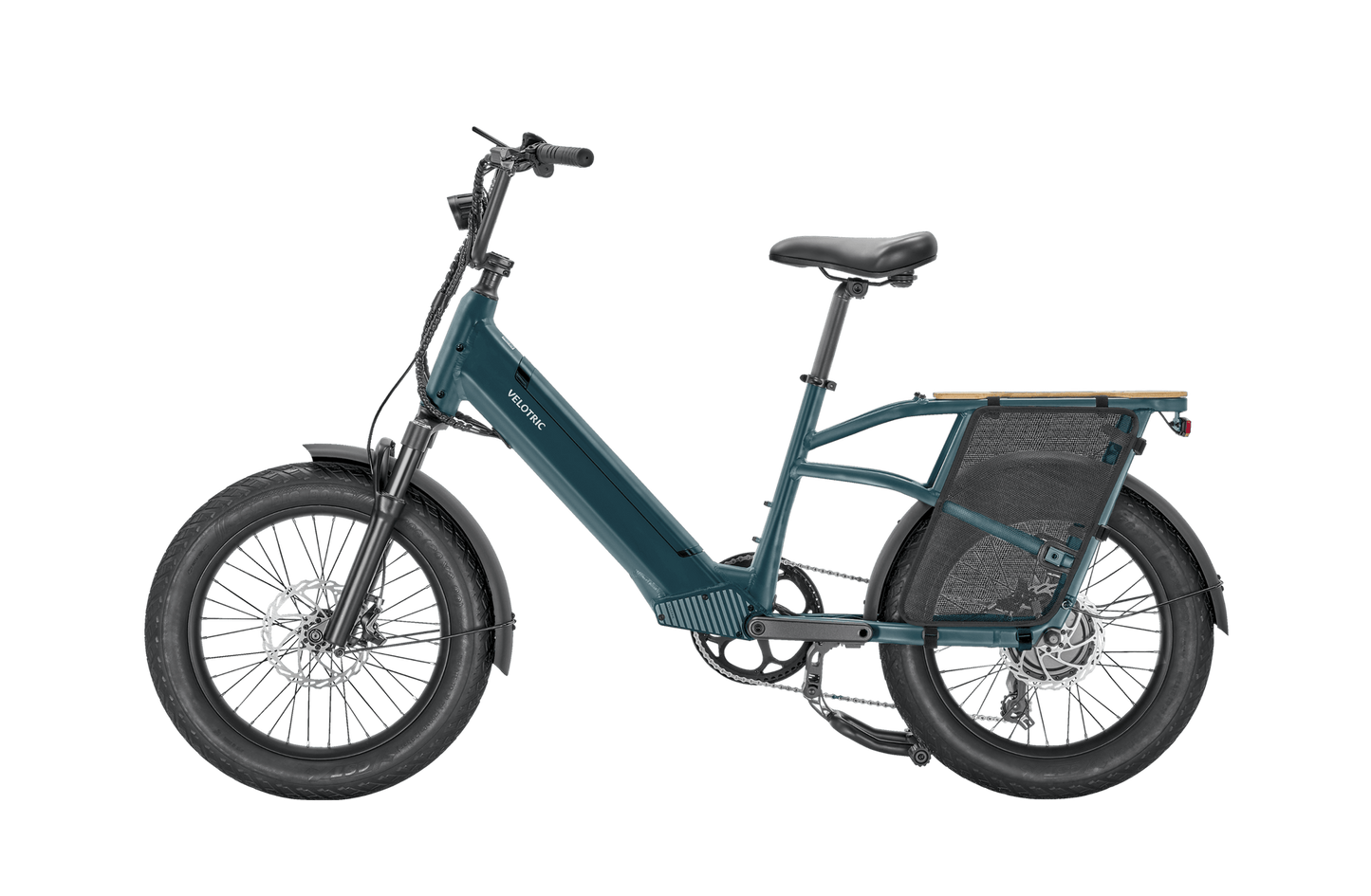 Teal Velotric Go 1 electric bicycle with thick tires, a rear carrier, and front suspension, isolated on a black background.