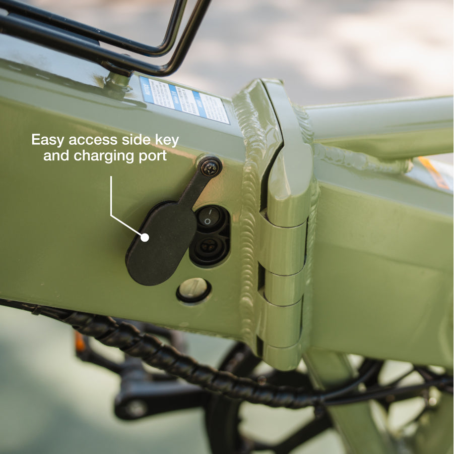 Close-up of the Lectric XP4's green folding frame displays the side key slot and charging port, labeled "Easy access on Lectric XP4" with an arrow highlighting these features.