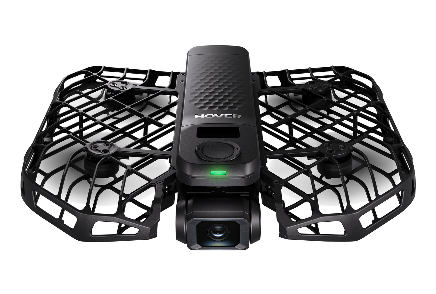 The HOVERAir X1 Pro by HOVERAir is a compact black drone with a protective cage and aerial camera. It features a textured top with the "Hover" logo and a green light indicator, ideal for capturing stunning footage on your eBike adventures.