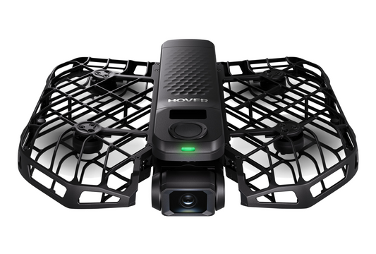 The HOVERAir X1 Pro by HOVERAir is a compact black drone with a protective cage and aerial camera. It features a textured top with the "Hover" logo and a green light indicator, ideal for capturing stunning footage on your eBike adventures.