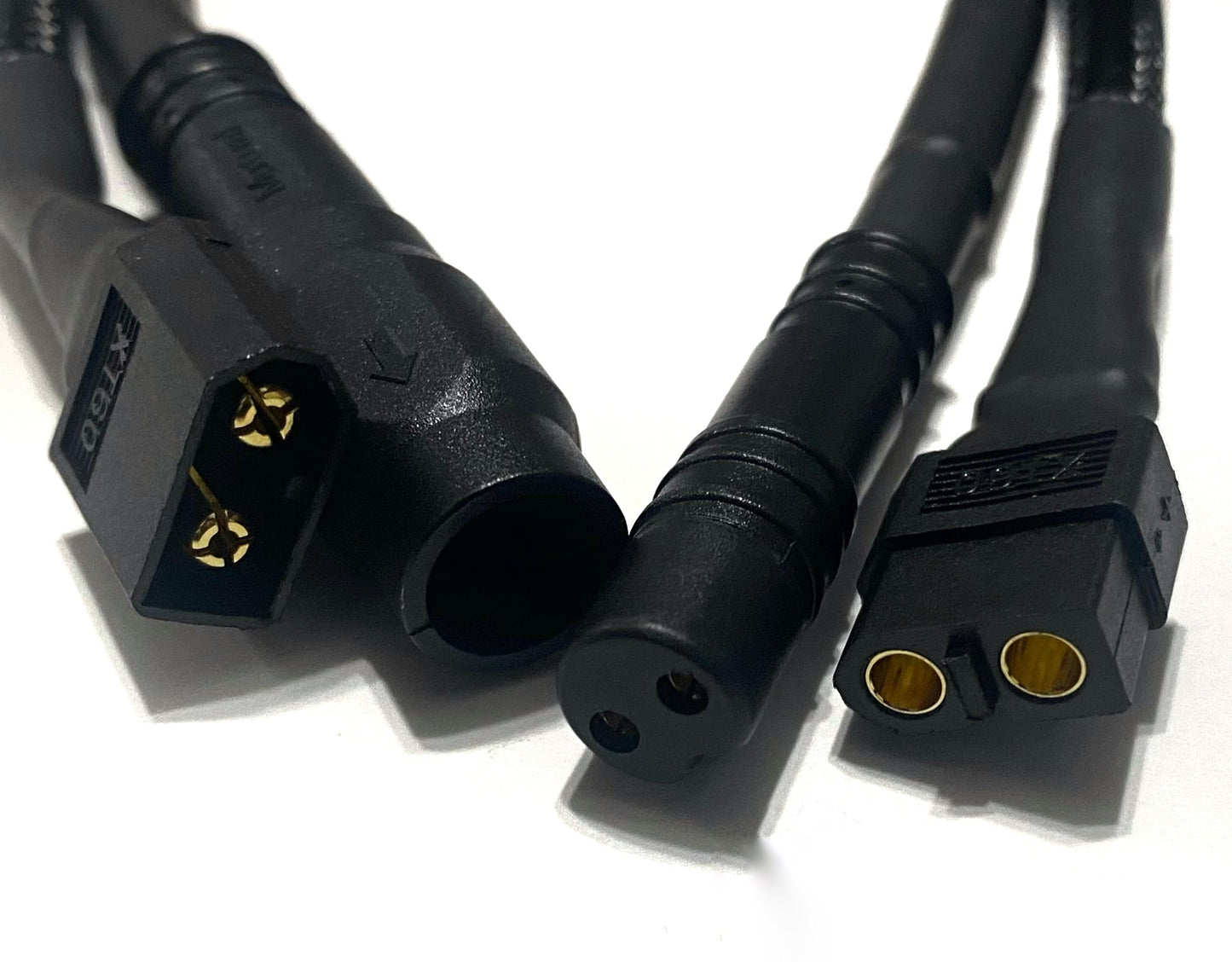 Close-up of three black XT60 Extension Cables by ElectricAllWheel, compatible with Rad, Himiway, MagiCycle, and Addmotor bikes. Features visible gold contacts and supports 14AWG wires. Suitable for power connections on a white background.