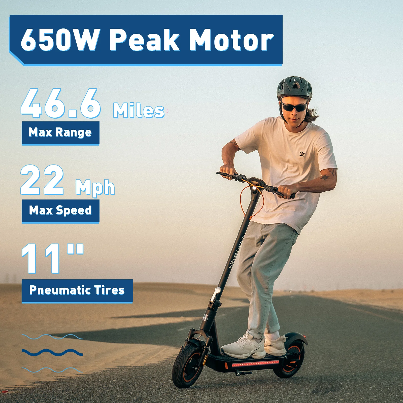A rider cruises on the Hiboy MAX Pro Electric Scooter for Heavy Adult by Hiboy, featuring a 650W peak motor, 46.6-mile range, top speed of 22 mph, and 11-inch pneumatic tires on a paved road flanked by sand.