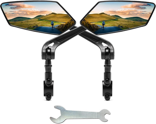 Two mirrors from Tampa Bay eBikes' "Mirrors - Premium Pair Handlebar" product set, display scenic landscapes and intersect artistically. Below them lies a wrench, complementing the setup with precision.