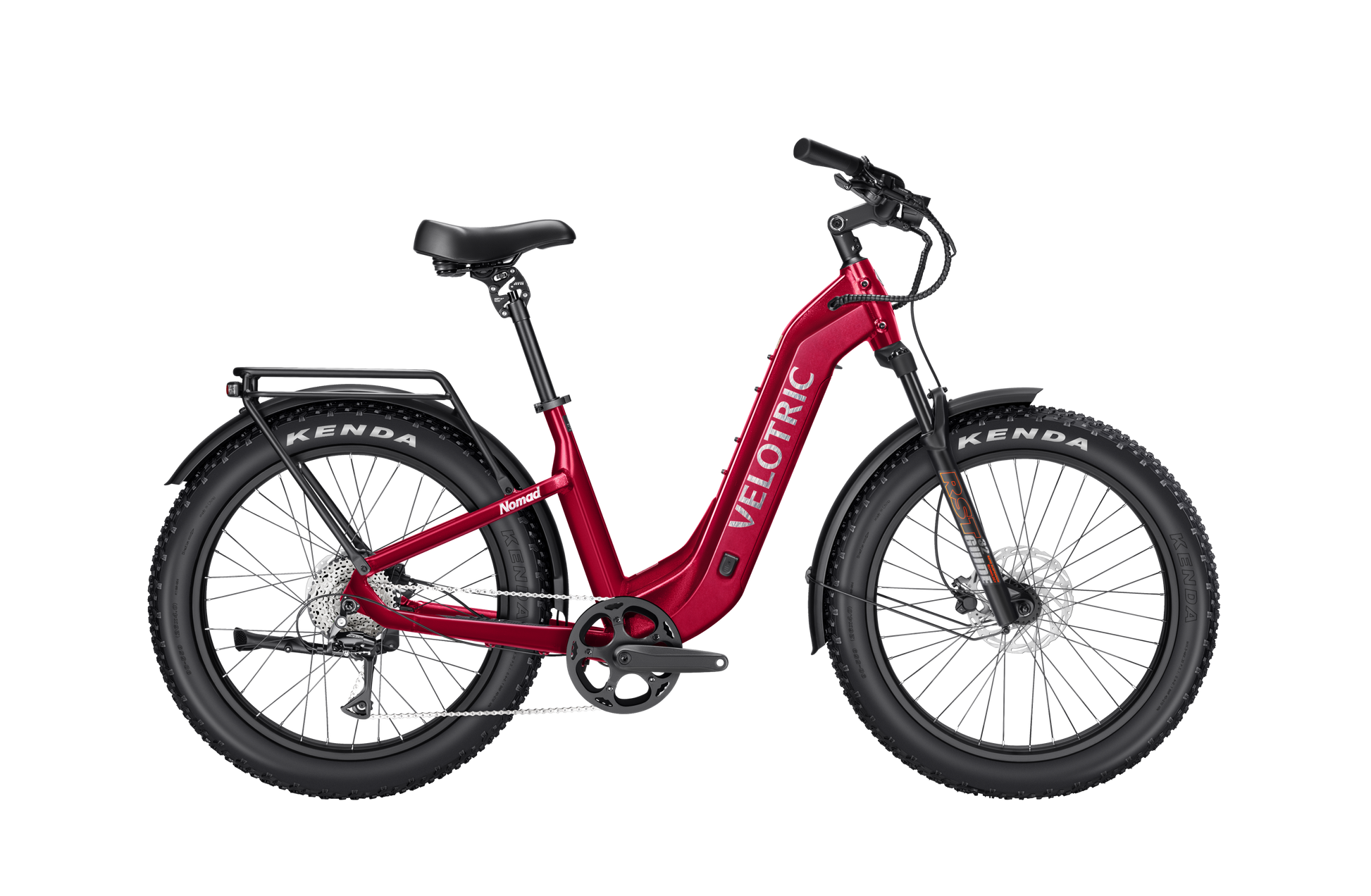 The Velotric Nomad 2, a red eBike for adventure seekers, comes with Kenda tires, a step-through frame, rear rack, and suspension fork. Its profile is perfectly displayed on a white background, making it ideal for all-terrain adventures.