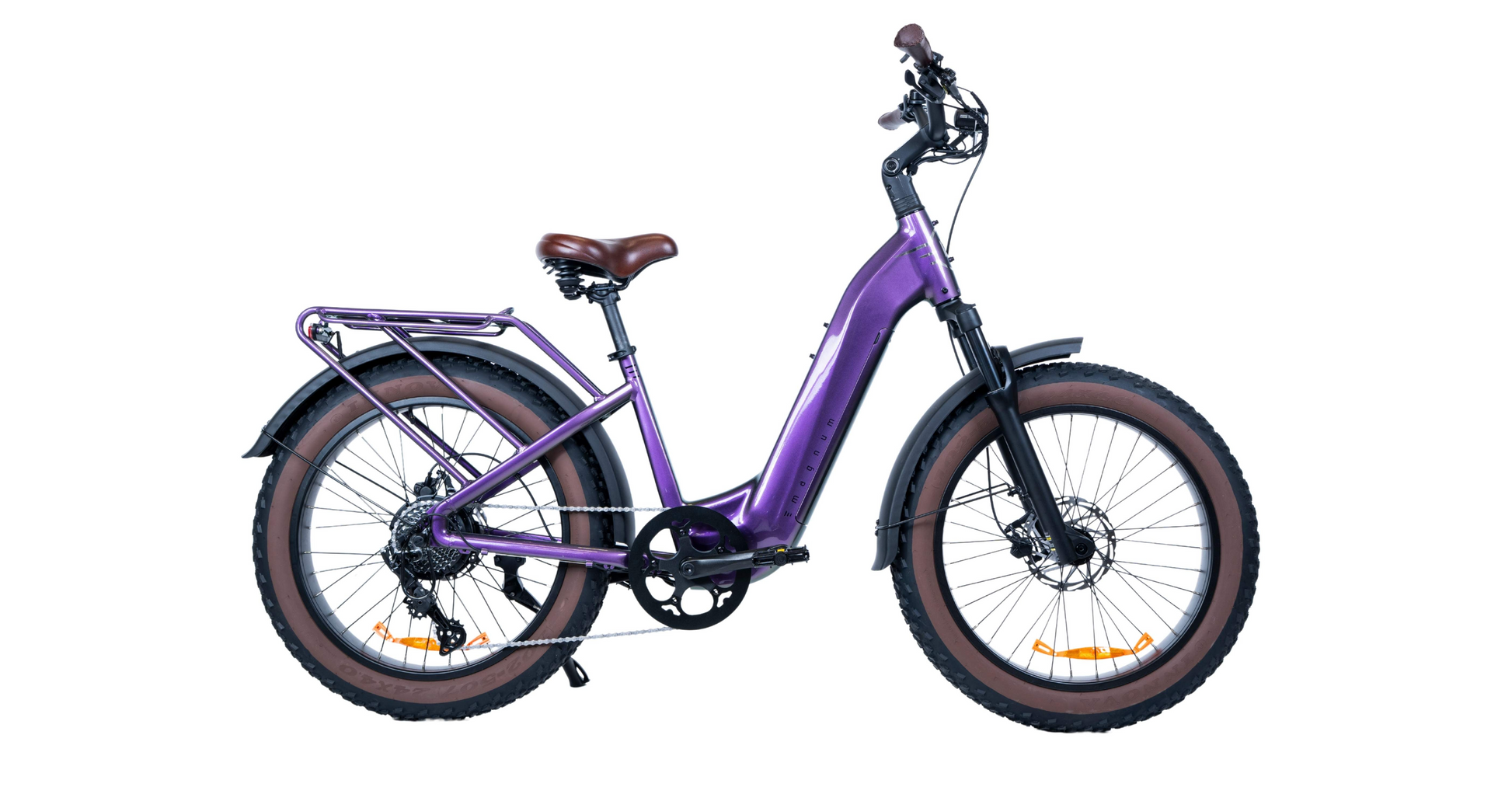 The Magnum - Bliss electric bike by Magnum features fat tires, a brown saddle, step-through frame, rear rack, fenders, disc brakes, and handlebar controls—displayed in profile on a white background.
