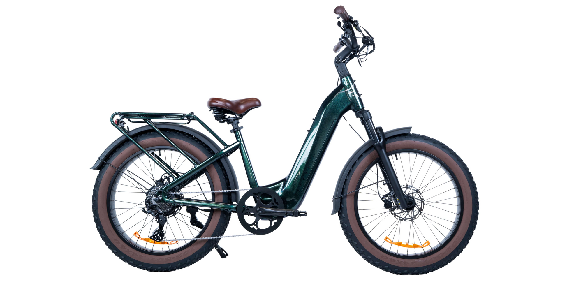The Magnum - Bliss by Magnum is an electric bike with a step-through frame, brown saddle, rear cargo rack, fat tires, front suspension, and disc brakes, shown in a side view on a white background.