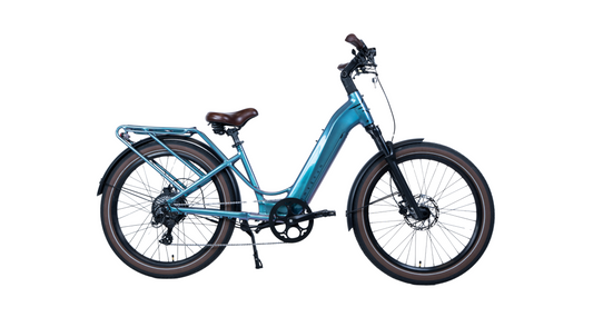 The Magnum Wave low-step cruiser eBike features a 500W motor, teal frame, brown saddle and tires, rear cargo rack, front suspension fork, and disc brakes. Displayed on a white background.