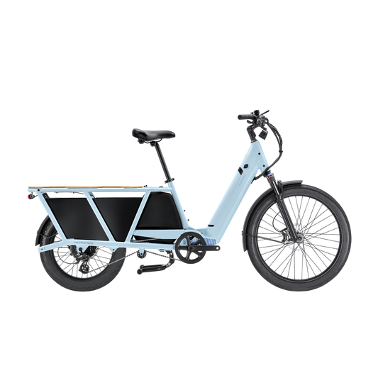 A Velotric - Packer 1 - Sky Blue electric bike with a black background.