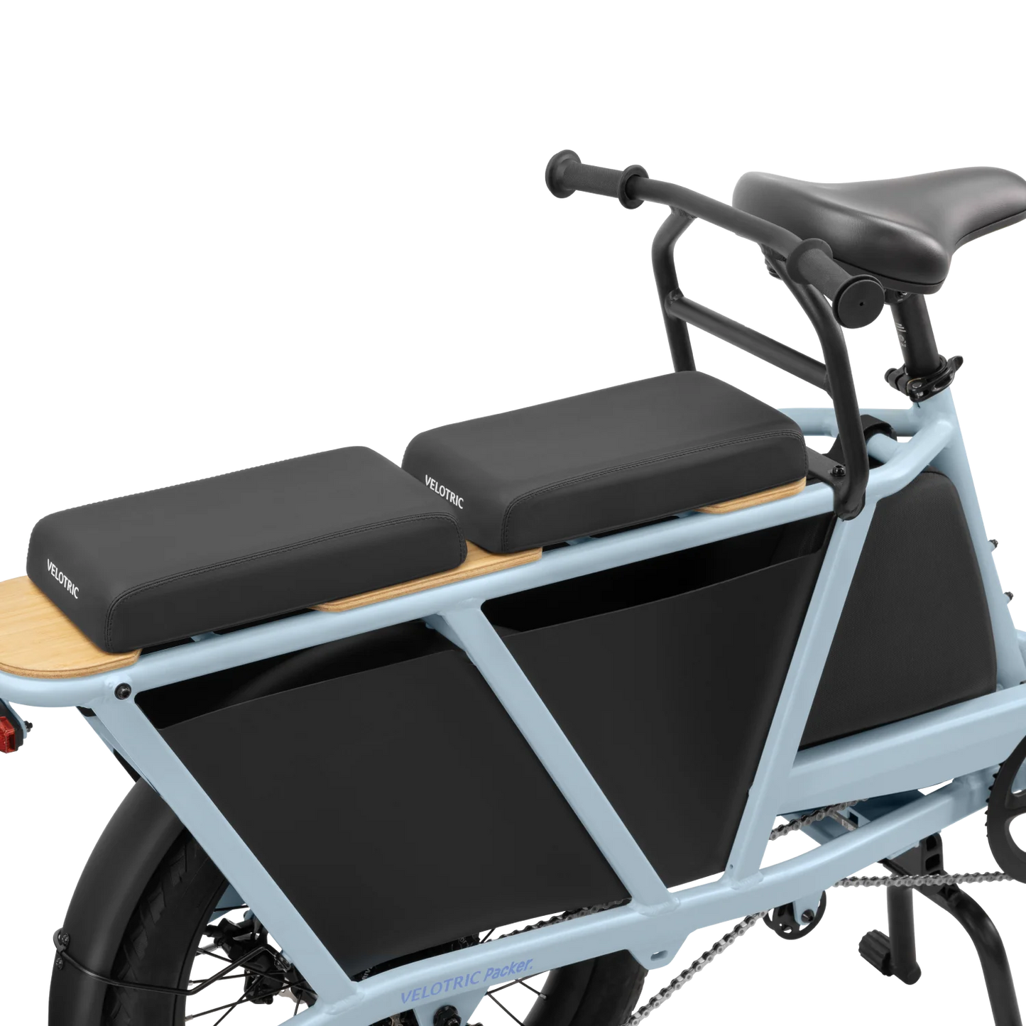 A blue electric bike with a Velotric Packer seat pad, perfect for long-distance riding.