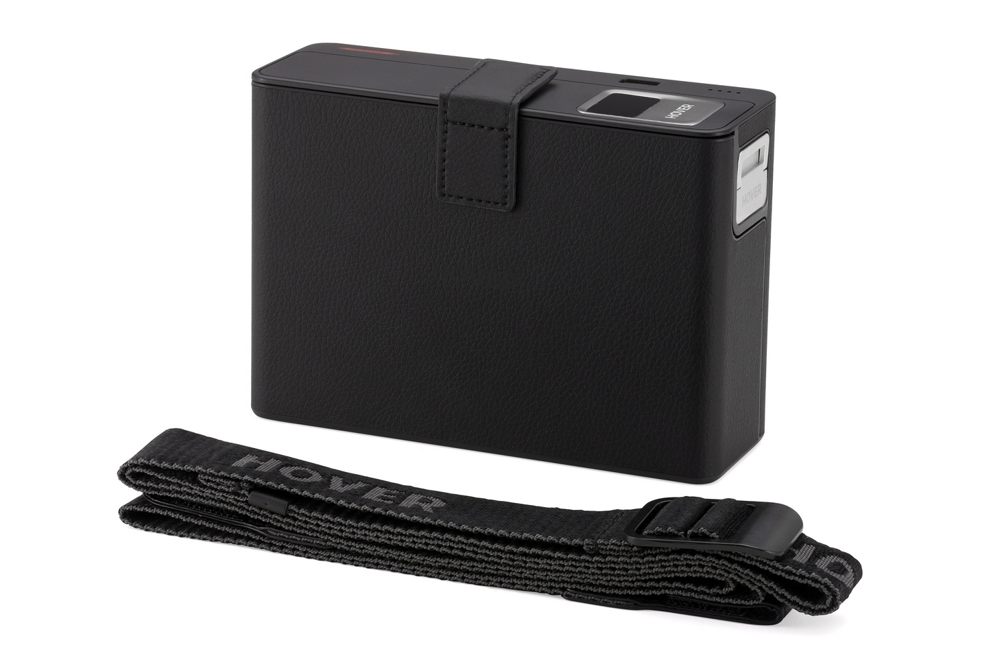 Rectangular HOVERAir Power Case with OmniTerrain capabilities and textured finish, featuring a strap in the foreground.