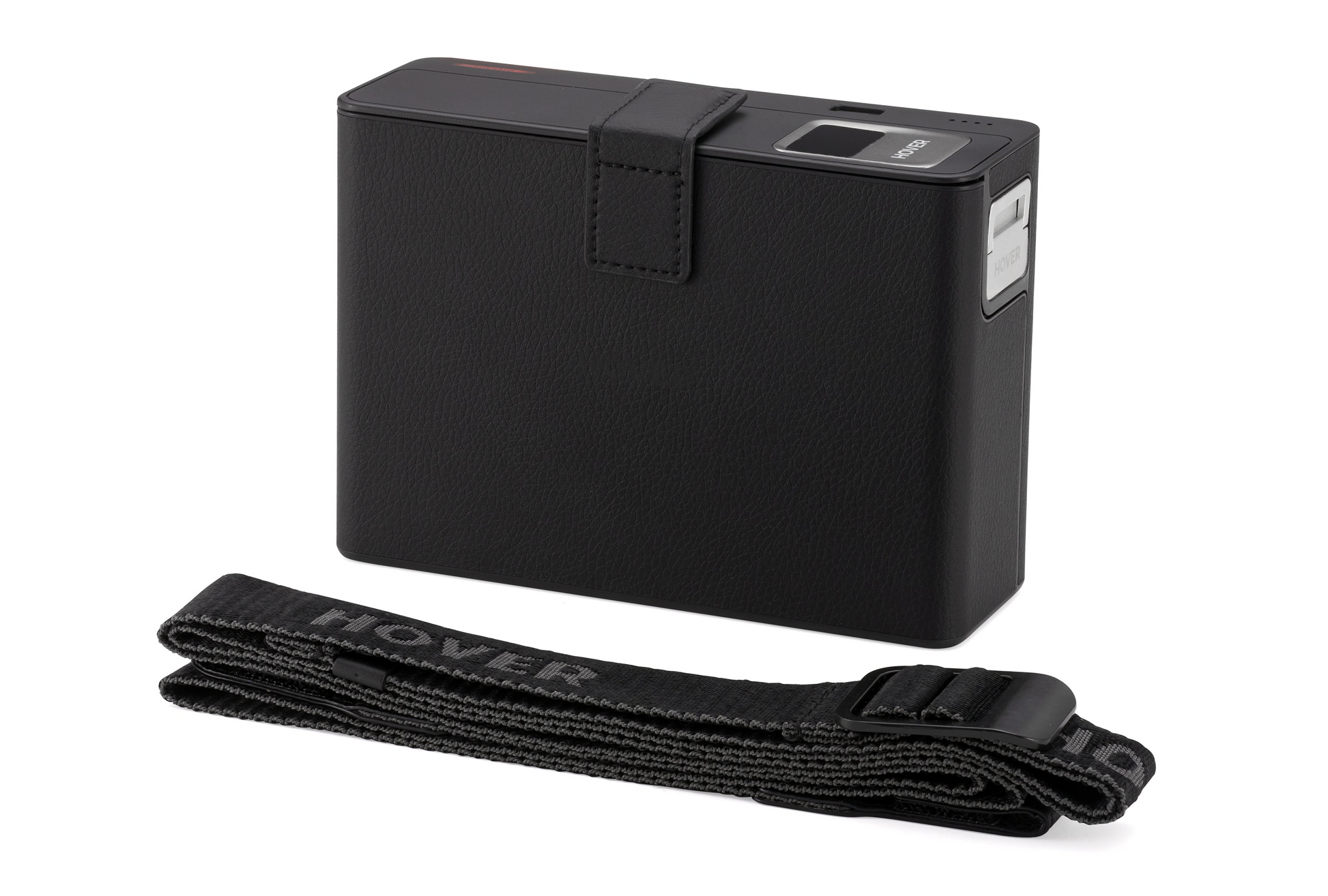 Rectangular HOVERAir Power Case with OmniTerrain capabilities and textured finish, featuring a strap in the foreground.