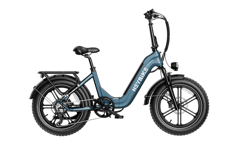 HeyBike- Ranger S in navy blue with thick tires, a rear rack, and a low-step frame featuring a 750W motor, isolated on a grey background.