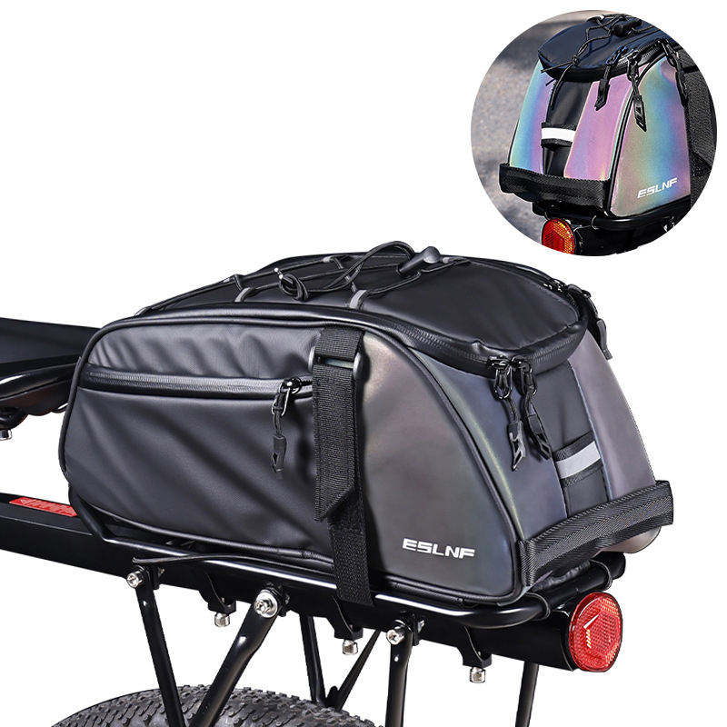 The Tampa Bay eBikes Bag - Rear Rack Rainbow Reflective is a black pannier that attaches to a rear bike rack, featuring zippers and reflective material.