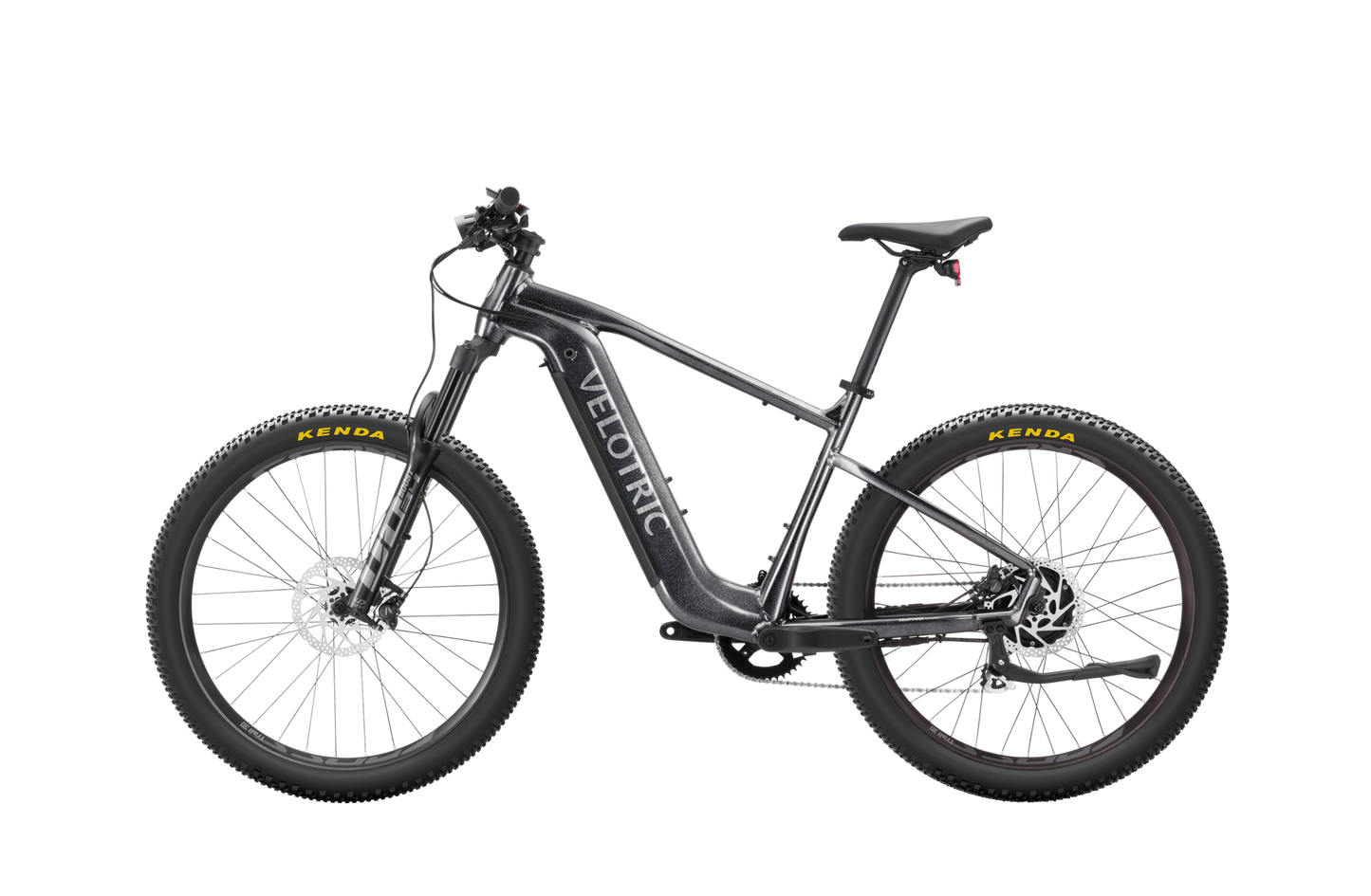 A black Velotric eBike equipped with Kenda tires, dual suspension, and disc brakes, isolated on a black background.