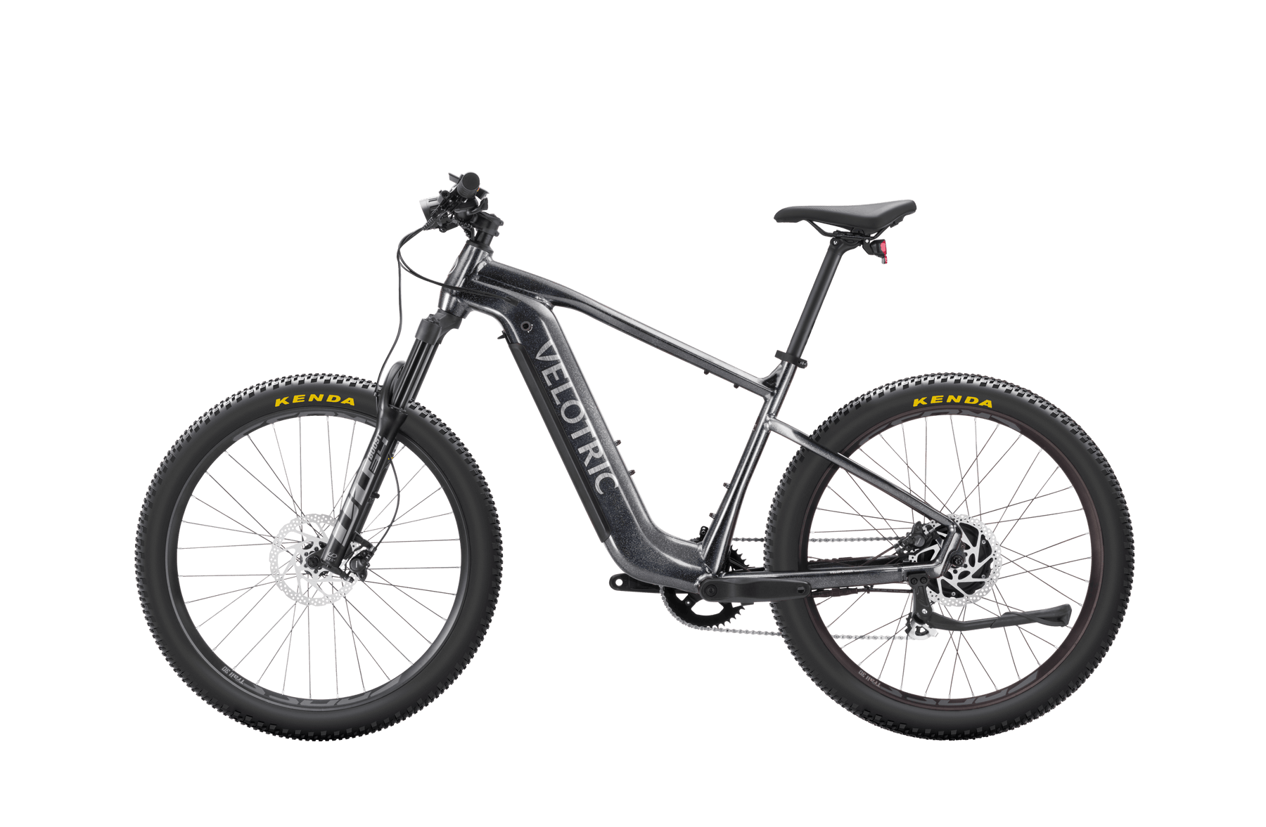 A black Velotric eBike equipped with Kenda tires, dual suspension, and disc brakes, isolated on a black background.