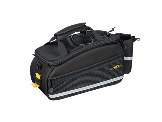 The ToPeak MTX Trunk Bag EX QuickTrack is a black bicycle pannier bag with MTX QuickTrack® compatibility, a top handle, side pockets, reflective striping, water repellency, and a zipper closure. It features a small yellow logo on the side.