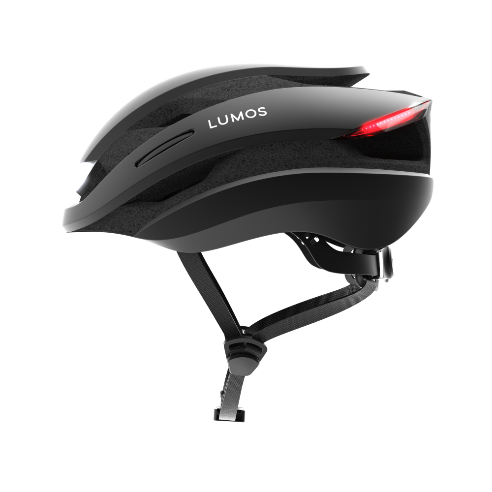 A Lumos Ultra MIPS helmet with integrated LED lighting, shown on a black background.