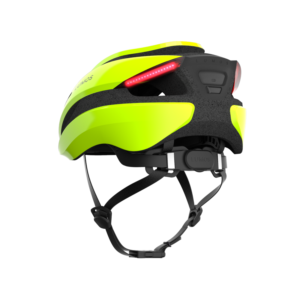 A high-visibility yellow Lumos Ultra MIPS Helmet with integrated LED lighting and MIPS technology on the back.